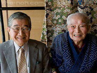 With his eldest son, Iwao (left), who carries on his passion for Noh and Nishijin textile
